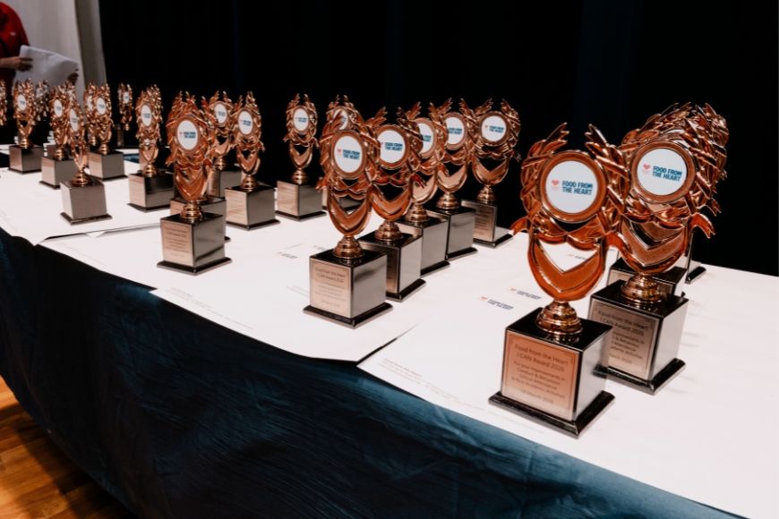 Trophies for award recipients at I CAN Award Ceremony 2026